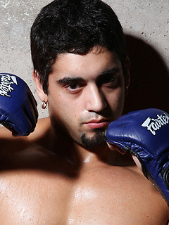 Muscled latino boxer shows his naked body
