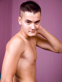 Superbly built young twink pokes his erected dick right into the camera