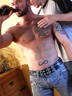 Tattoed and pierced hunk get serviced by hungry gay