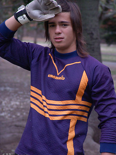 Naked guy relaxing after football