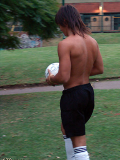 Naked guy relaxing after football