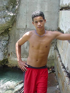 Sexy latino twink posing for the camera outdoors