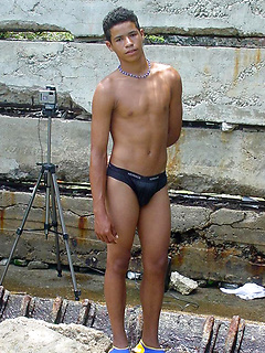 Sexy latino twink posing for the camera outdoors