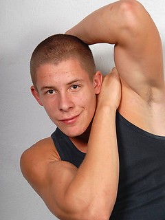 Muscled jock posing and showing his strong body