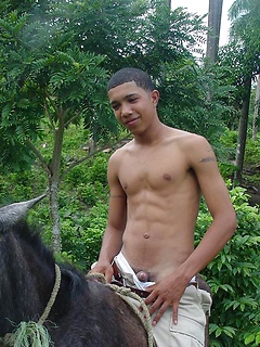 Sexy latino twink posing for the camera outdoors