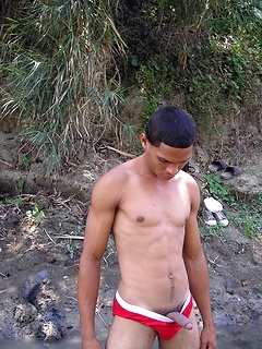 Muscled teen latino pleases himself