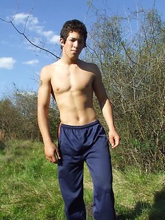 Twink with sexy perfect body stripping outdoors