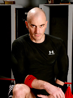 This cocky stud beats his jock-piece and shoots a herculean jizz spray across the bench