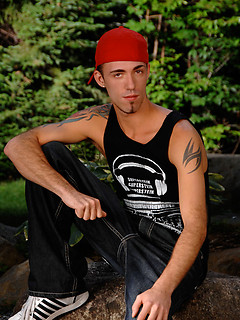 Tattoed student solo posing