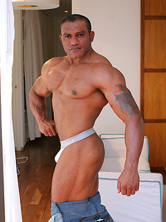 Big bodybuilder Pedros Marcos showing his brown uncut dick