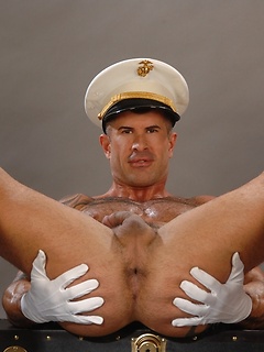 Hottest muscle guy posing in leather and sailor uniforms