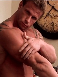 Two muscle hunks jerking off