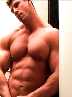 Two muscle hunks jerking off