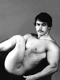 Guy with a mustache in hot retro pics
