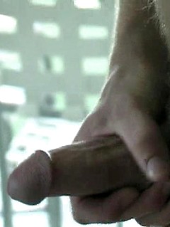 Sexy white-haired jock stroking dick
