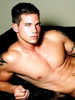 Sexy fitness model Dan Burch poses