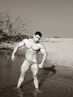 Strong macho posing outdoor