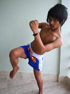 16 photos of cute gay Thai kickboxer posing and stripping
