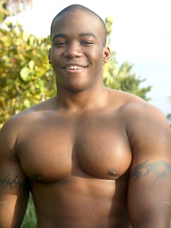 Young black stud demonstrates his athletic body