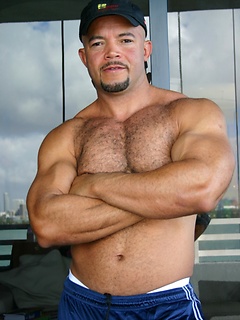 Big latin hunk shows his haity muscled chest