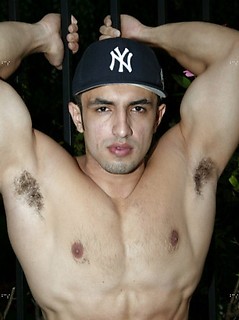 Muscled latin man posing