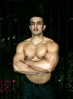 Muscled latin man posing