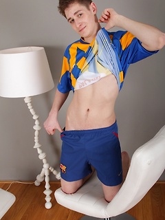 Athletic Marc Sense strokes his cock on his soccer ball.