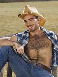 Smiley cowboy man showing his nude hairy chest