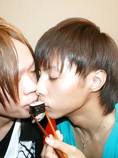 Two japanese boys go into a 69, licking and sucking one another