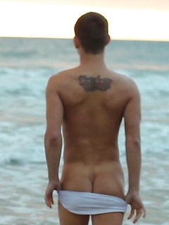 Jacobey London jerks off on a nude beach while checking out other hot naked guys