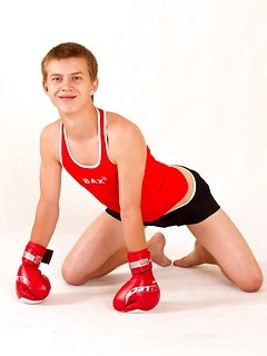 Sporty straight Eugene Small posing in boxing gloves