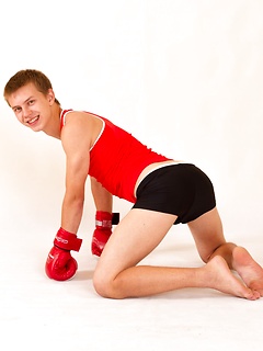 Sporty straight Eugene Small posing in boxing gloves