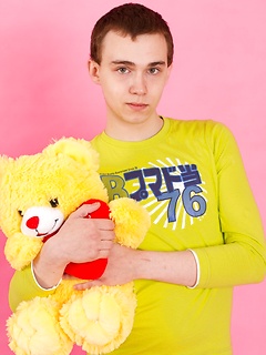 Straight guy Timmy Wright exposes his body with teddy in hands