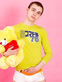 Straight guy Timmy Wright exposes his body with teddy in hands