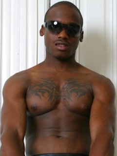 Black stud with tattoed chest