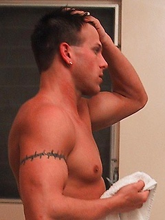 Oz then treats us to a shower and a body that is perfect in every way