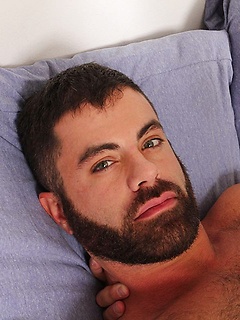 Marcus Isaacs has green bedroom eyes and a furry chest