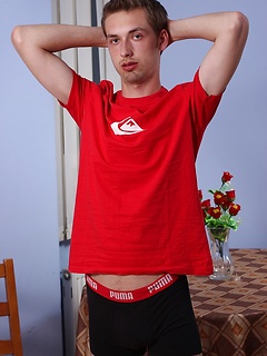 Lawrence pulls his boxers down and reverse grips his cock.