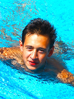 Superboy Alec relaxing on the beach